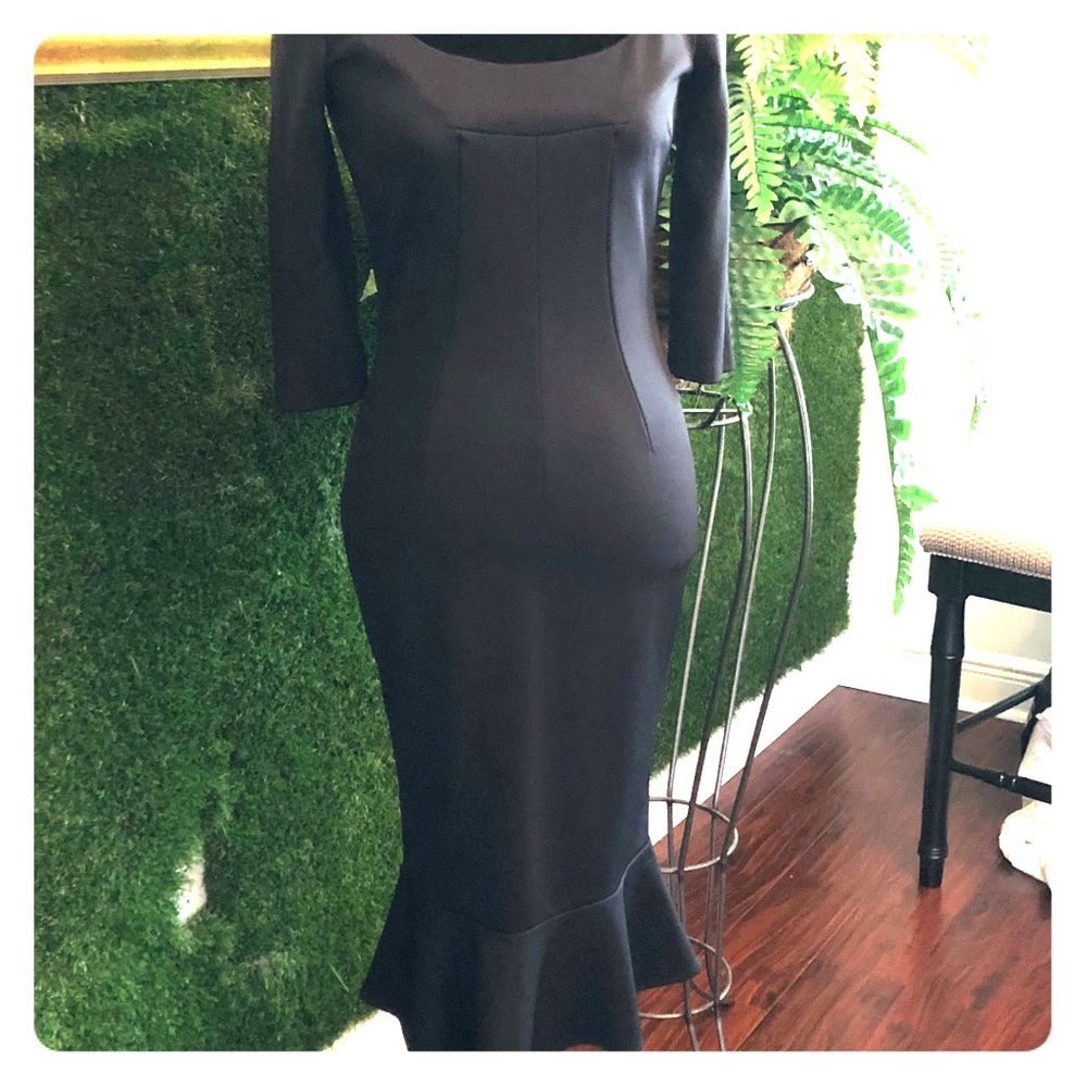 Dolce & Gabbana body conscious cocktail dress.